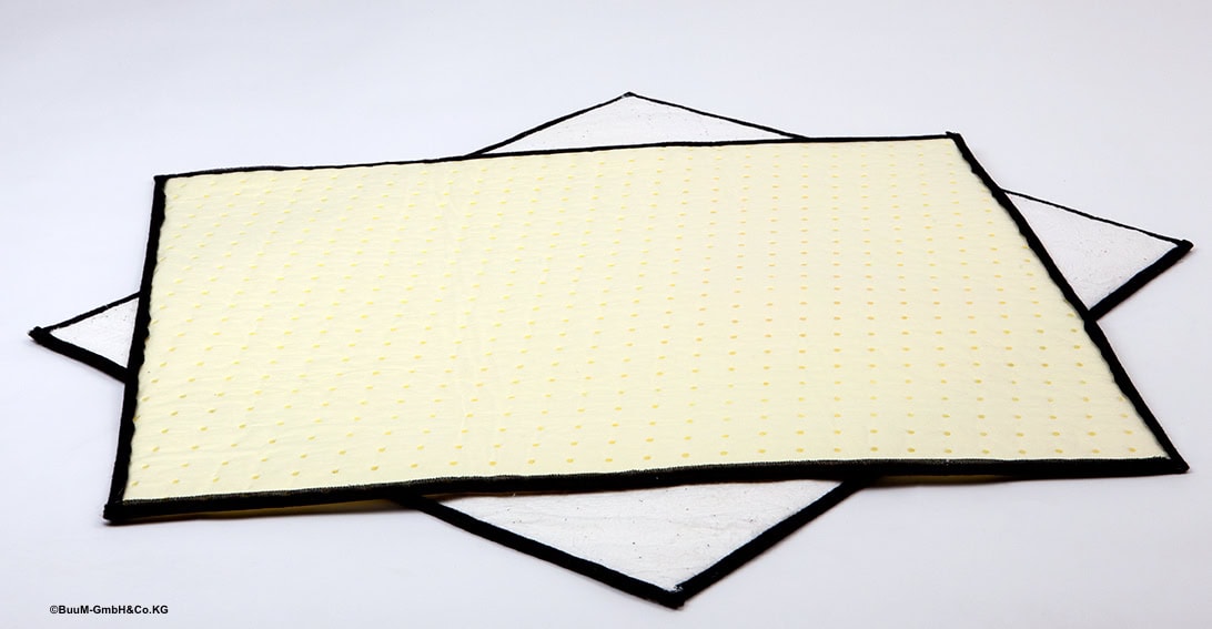 Yellow oil-absorbing mat with a black border